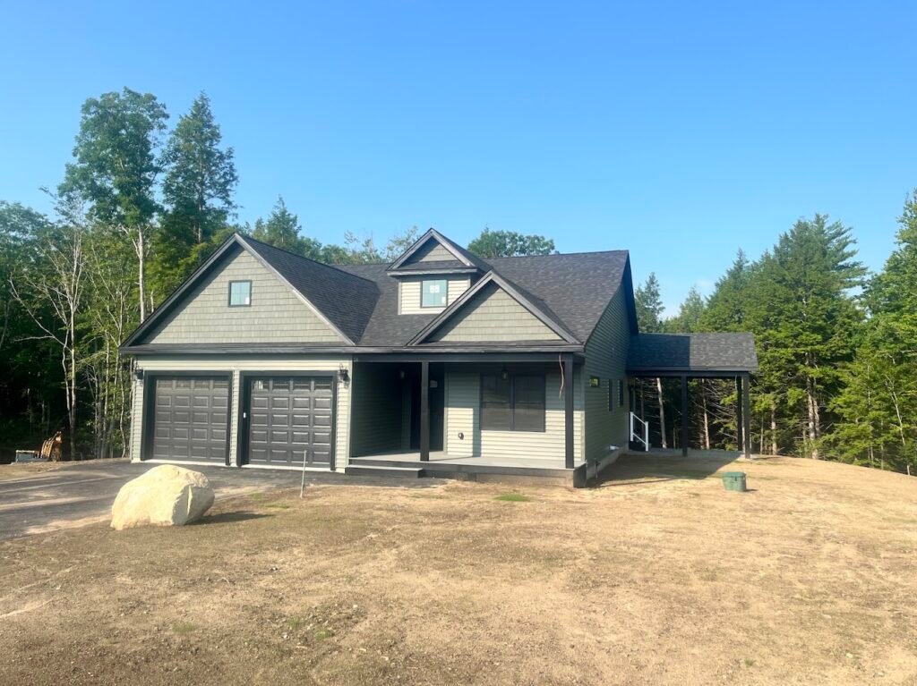 Candia new construction: Similar home shown. Finishes and site details may vary.